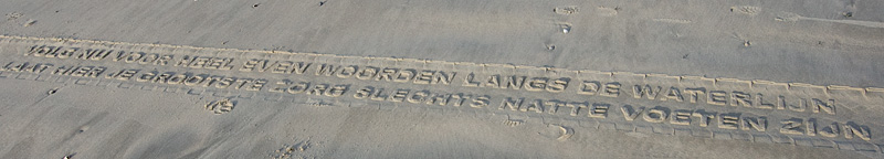 DSC_3960.jpg - een tractor rijdt poëzie uit over het strand